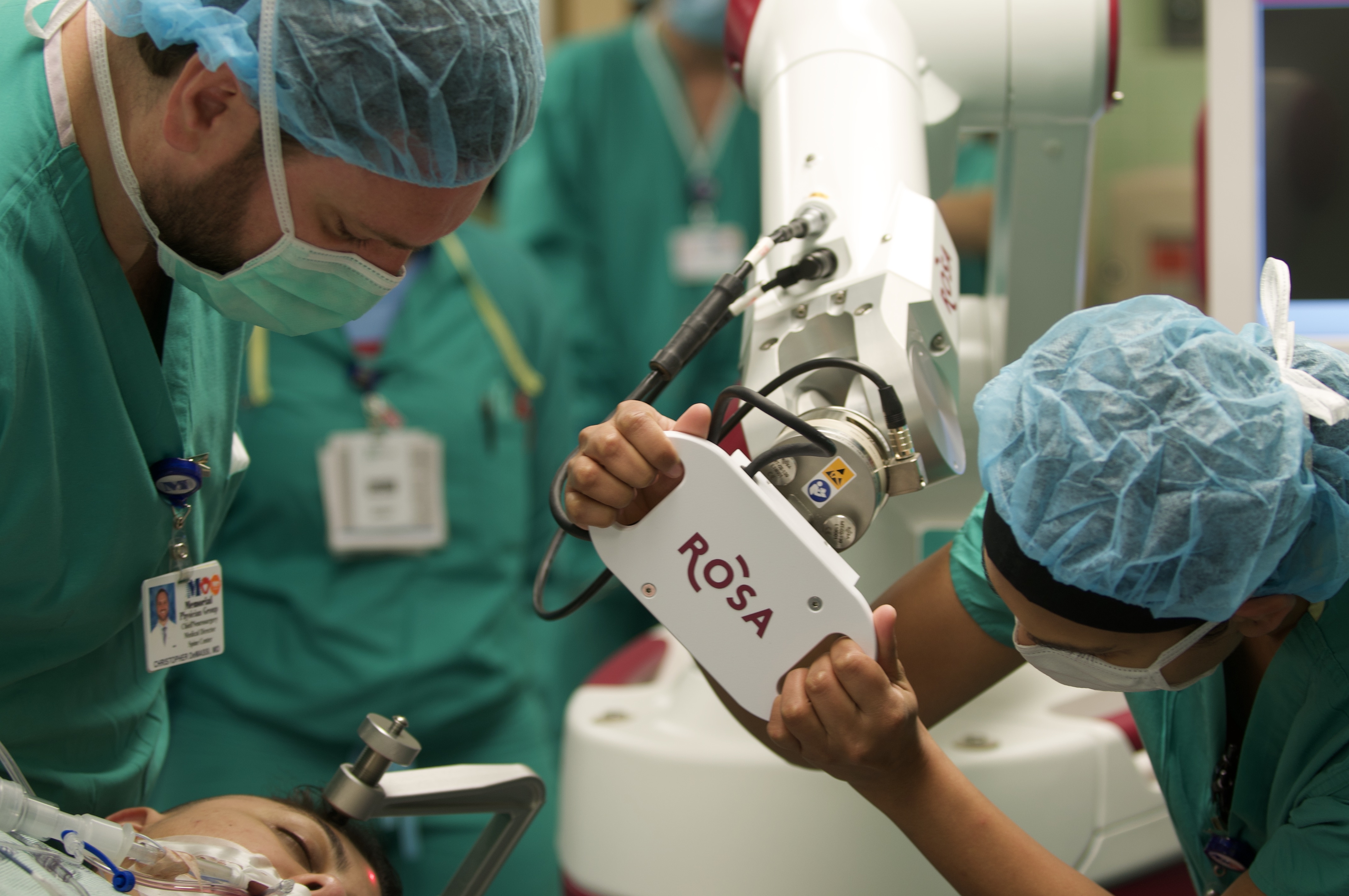 Doctors performing brain surgery