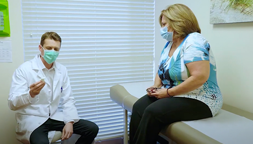 Dr. Alex Fokin talks to patient