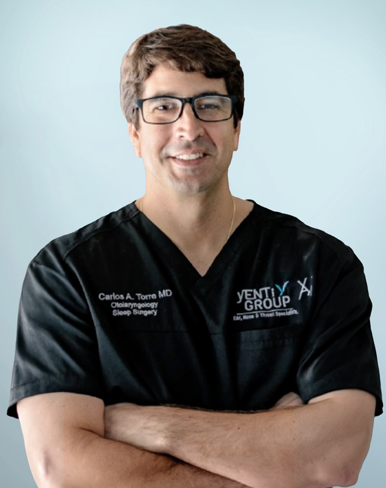 Headshot of Carlos Andres Torre