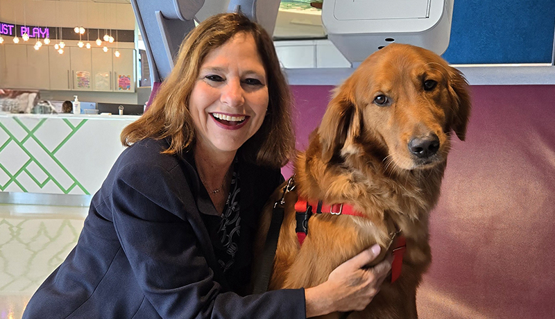 Beth-Ann Krimsky and pet therapy dog at Joe D