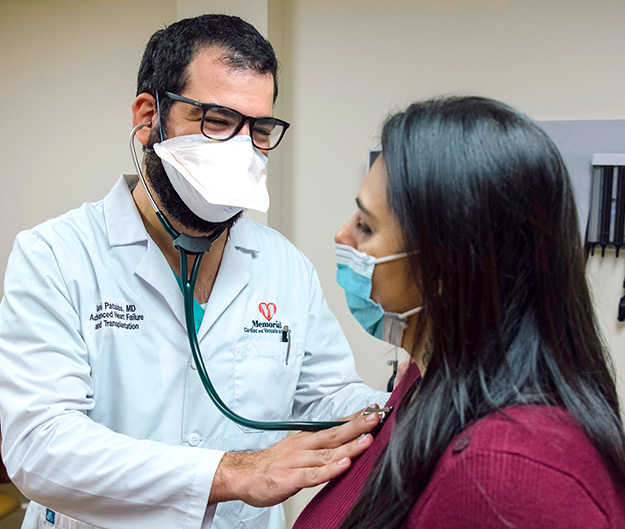 Nancy with Iani Patsias, MD having a check-up after her heart transplant