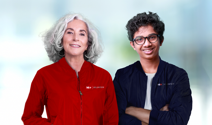 woman and man wearing Memorial Healthcare System volunteer jackets