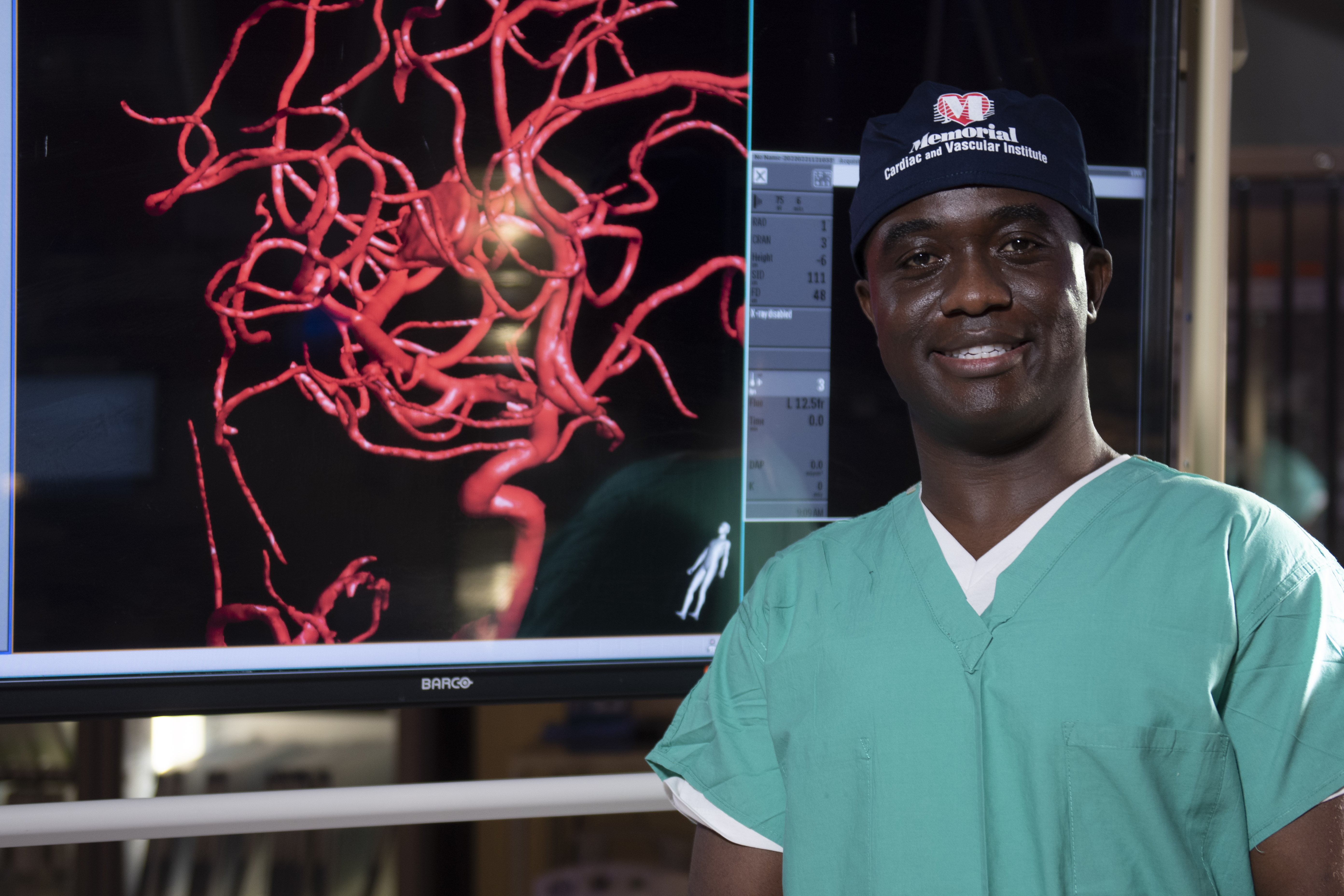 Doctor next to aneurysm image