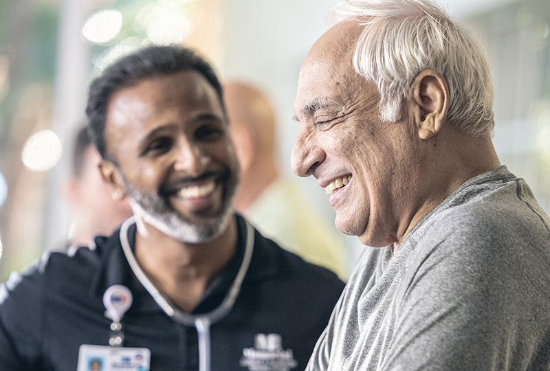 anthony encouraging patient on treadmill