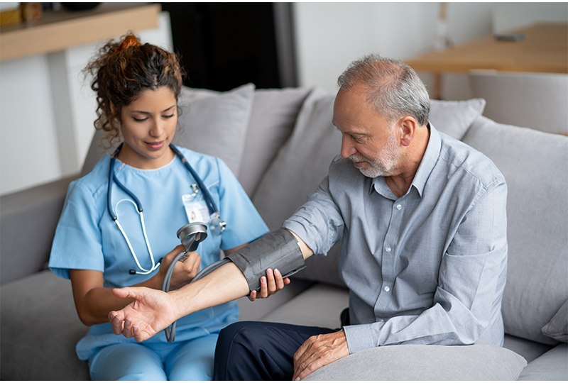 home health nurse with man