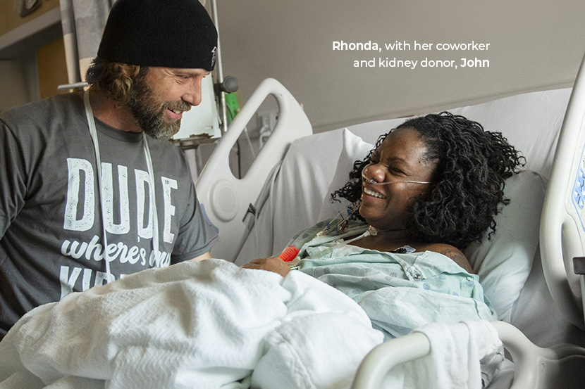 Rhonda, who had a kidney transplant, with her coworker and donor, John