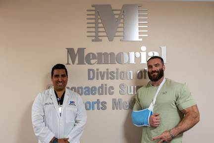 Dr. Giorgio Negron and Kyrylo wearing arm sling after shoulder PRP therapy
